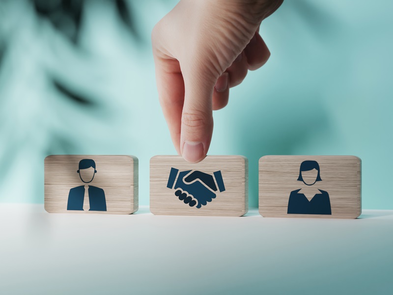 Wooden blocks with an icon of a woman and a man and mediation. Concept of mediation between spouses, divorce. Divorce proceedings before the Court. The role of the mediator... Collaborative Divorce Collaborative Practice KC Same as Mediation